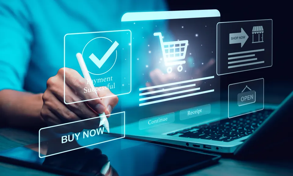 Online shopping and payment symbols over a laptop